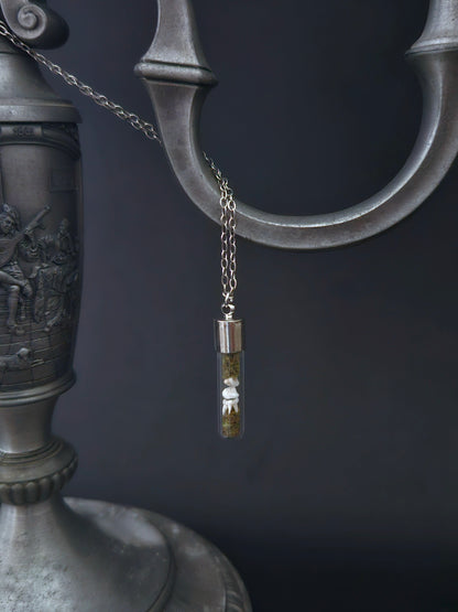 Rat teeth oddity vial