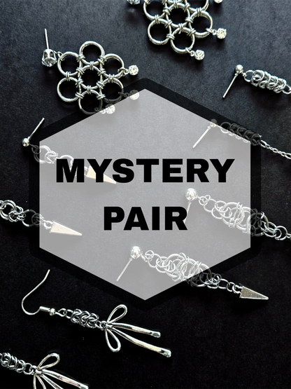 Mystery pair of earrings